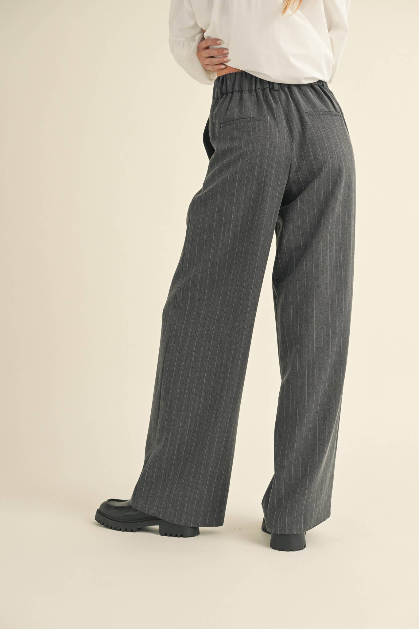 High-Waisted Pinstripe Wide Leg Trousers – Pleated Waist with Pockets & Zip Closure